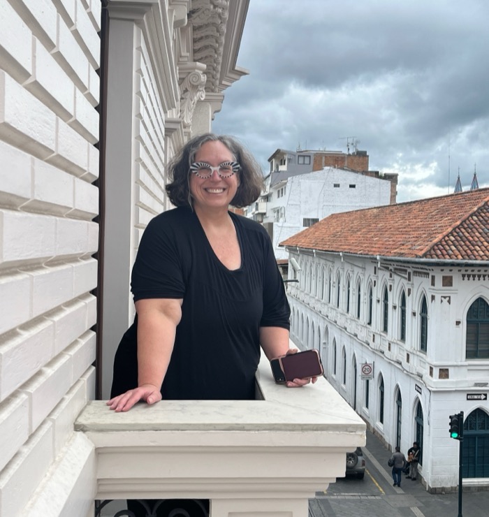 Carolyn on a colonial balcony in South America